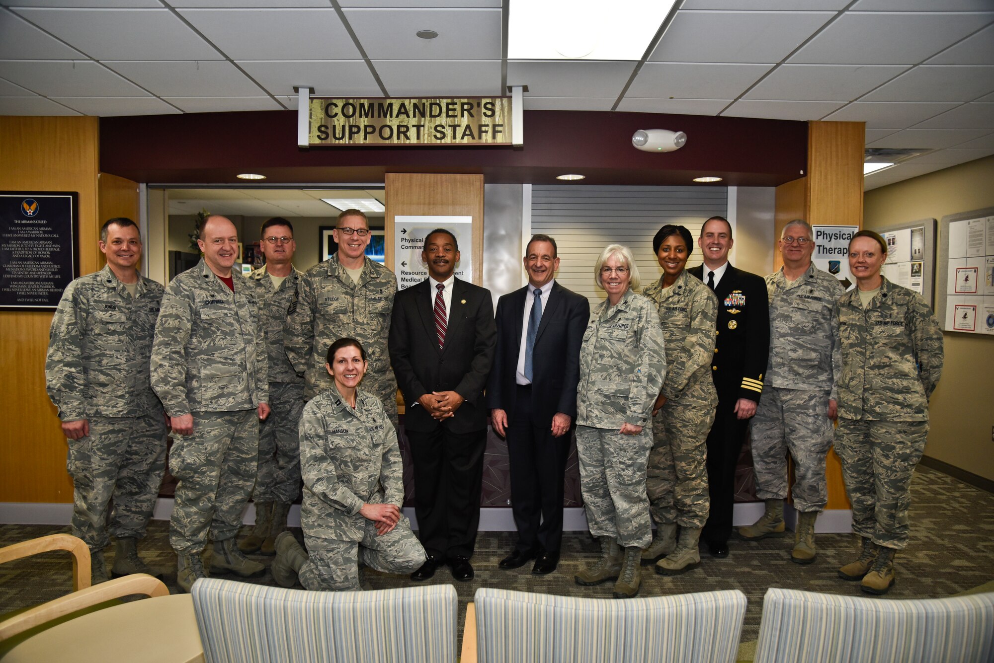 Members from the 92nd Medical Group pose with Dr. Jonathan Woodson, Assistant Secretary of Defense for Health Affairs, Dr. William Roberts, Military Health System Electronic Health Record Functional Champion, and Navy Commander Jason Todd Lewis, Military Assistant to the Assistant Secretary of Defense for Health Affairs, during a tour Jan. 15, 2016, at Fairchild Air Force Base, Wash. The tour was part of the testing and rollout process for the Defense Department’s new EHR program, a graduated platform for DOD integration with the Department of Veterans Affairs and other healthcare network partners. (U.S. Air Force photo/Airman 1st Class Taylor Bourgeous)