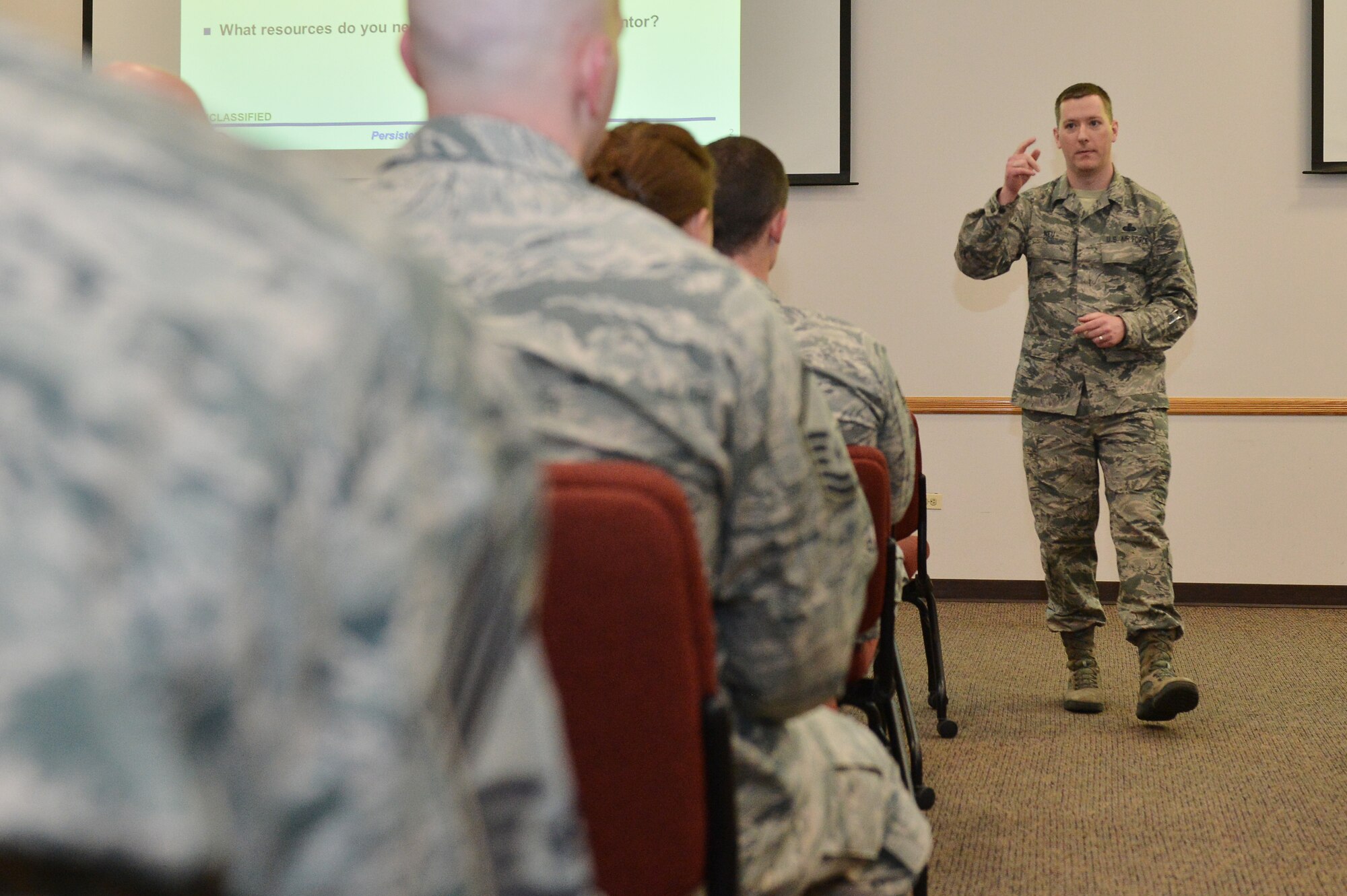 Senior Master Sgt. Michael Neu, 460th Space Wing career assistance advisor, talks about the new Buckley Mentoring Program Jan. 28, 2016, on Buckley Air Force Base, Colo. The Buckley Mentoring Program, which is overseen by the 460th Space Wing command chief, matches applicants with a mentor who can best assist them and is open to all Team Buckley members. (U.S. Air Force photo by Staff Sgt. Darren Scott/Released)