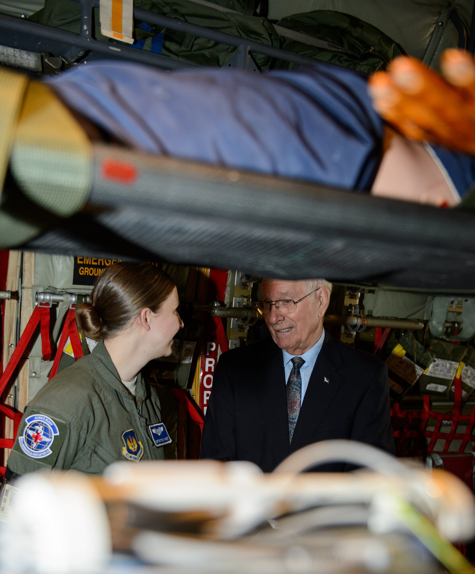 Sam E. Parish, retired Chief Master Sergeant of the Air Force, right, speaks with Staff Sgt. Brittany Wheat, 86th Aeromedical Evacuation Squadron aeromedical technician, during a base visit Jan. 26, 2016, at Ramstein Air Base, Germany. Airmen from the 86th Airlift Wing demonstrated the wing’s capabilities prior to Parish guest speaking at a chief induction ceremony. The Airmen of the 86th showed Parish how they generate and employ air mobility enabling theater and strategic airpower by operating a key Air Force power projection platform at Ramstein. (U.S. Air Force photo/Staff Sgt. Armando A. Schwier-Morales)