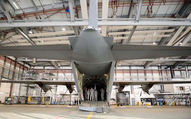 Airmen from the 86th Airlift Wing showcase their mission to Sam E. Parish, retired Chief Master Sergeant of the Air Force, during a visit to the base Jan. 26, 2015 at Ramstein Air Base, Germany. Parish visited many units around base to learn about their capabilities and learn more about the Air Forces after he retired. The Airmen of the 86th showed Parish how they generate and employ air mobility enabling theater and strategic airpower by operating a key Air Force power projection platform at Ramstein.  (U.S. Air Force photo/Staff Sgt. Armando A. Schwier-Morales)