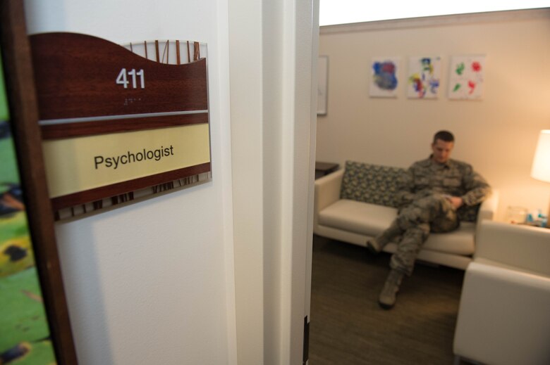 Maj. Matthew Willerick, Mental Health Flight commander, reviews paperwork at the 66th Medical Squadron Mental Health Clinic Jan. 26. This week the Hanscom Air Force Base, Mass., clinic celebrated Biomedical Sciences Corps Appreciation Week to recognize the contributions of both clinical and non-clinical BSC career fields. (U.S. Air Force photo by Jerry Saslav)