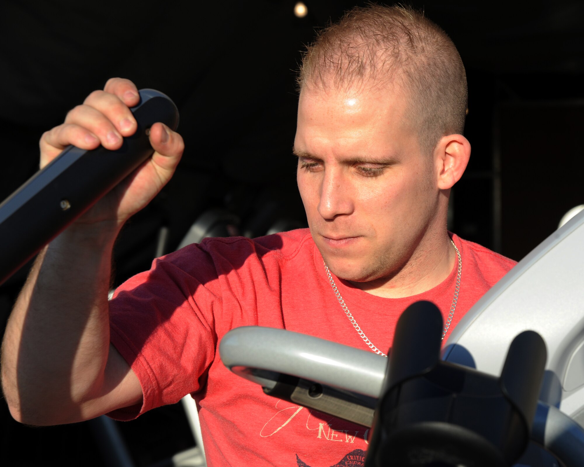 U.S. Air Force Staff Sgt. Scott Turnell, 39th Force Support Squadron fitness specialist and sports director, lifts a treadmill for the new Patriot Village fitness facility Jan. 27, 2016, on Incirlik Air Base, Turkey. The facility includes cardio machines, free weights and weight machines.  (U.S. Air Force photo by Airman 1st Class Daniel Lile/Released)