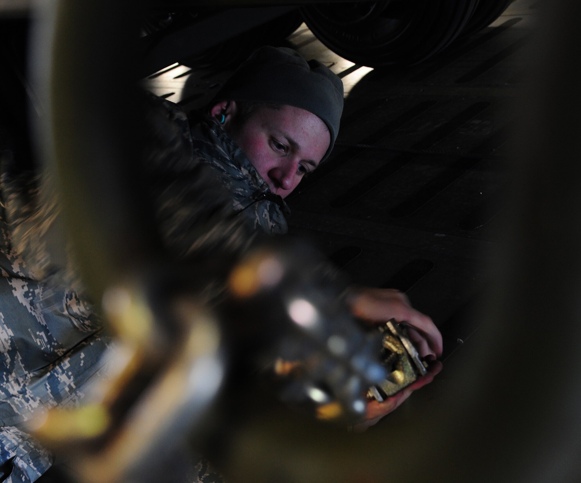 U.S. Air Force Tech. Sgt. Ryan Harrison, a 709th Airlift Control Squadron (ACS) loadmaster, secures cargo on a C-5 Galaxy aircraft at Whiteman Air Force Base, Mo., Jan. 25, 2016. Members of the 709th ACS transported equipment to Patrick AFB, Fla., to provide maintenance support for the 442d Fighter Wing A-10 Thunderbolt II during a multi-week combat search and rescue exercise. (U.S. Air Force photo by Senior Airman Keenan Berry)