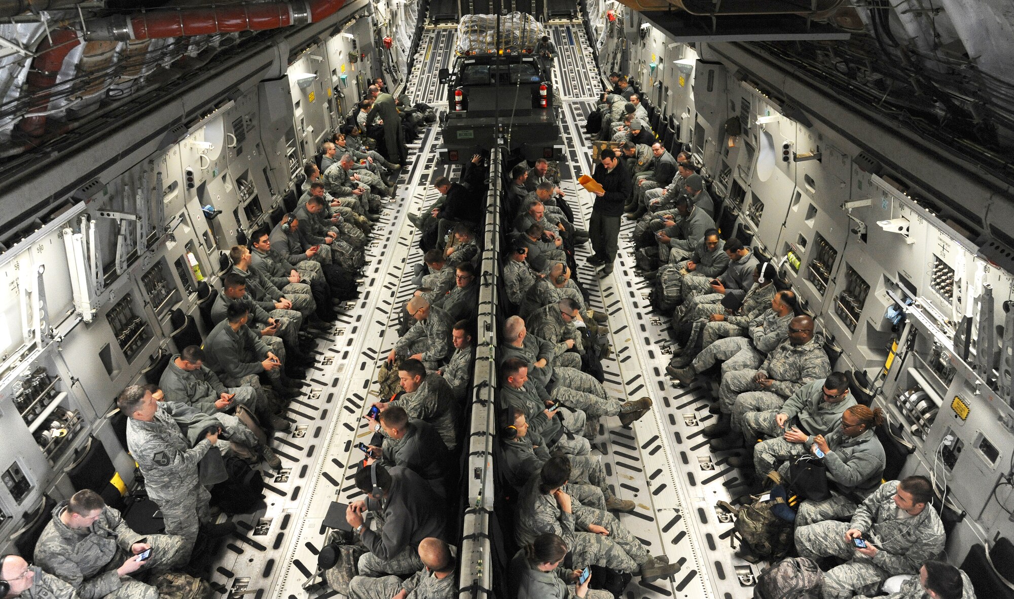 Personnel from the 442d Fighter Wing at Whiteman Air Force Base, Mo., prepare for take-off in a C-17 Globemaster III from Charleston AFB, S.C., Jan. 24, 2016. The aircraft was loaded with more than 14,000 pounds of cargo for a combat search and rescue exercise at Patrick AFB, Fla. (U.S. Air Force photo by Airman 1st Class Michaela R. Slanchik)