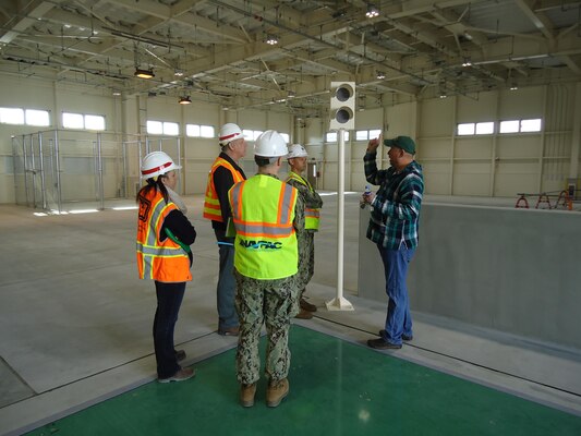 The Marine Corps Air Station Iwakuni Facilities Department command group
tours the new recycling center during the final inspection on Jan. 15. This
is the final step before the U.S. Army Corps of Engineers, Japan District turns the keys over to the U.S. government. 

