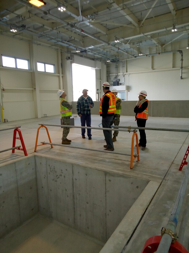 The Marine Corps Air Station Iwakuni Facilities Department command group
tours the new recycling center during the final inspection on Jan. 15. This
is the final step before the U.S. Army Corps of Engineers, Japan District turns the keys over to the U.S. government. 
