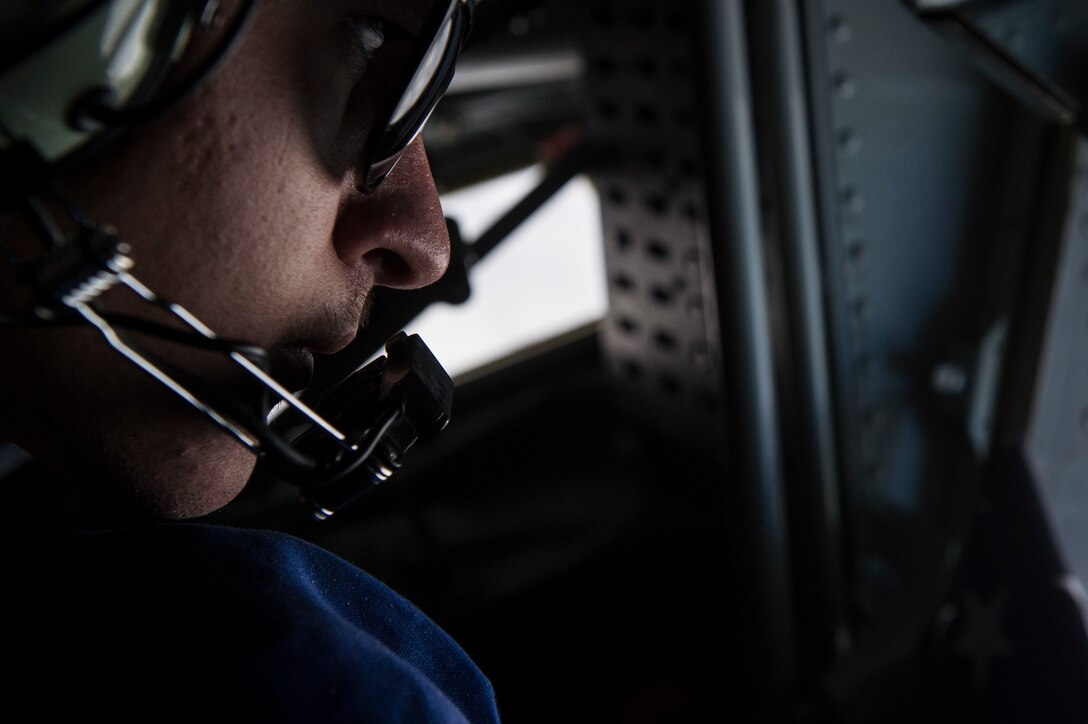 Air Force Airman 1st Class Nicholas Sowder flies on a KC-135 Stratotanker aircraft over the Arabian Sea, Jan. 27, 2016. Sowder is a boom operator assigned to the 340th Expeditionary Air Refueling Squadron, deployed from the 351st Air Refueling Squadron in RAF Mildenhall, England. Air Force photo by Staff Sgt. Corey Hook