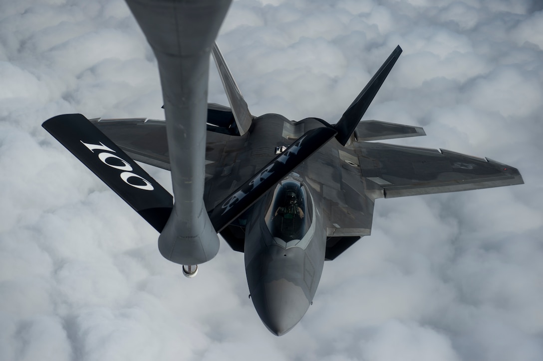 An Air Force F-22 Raptor approaches a KC-135 Stratotanker to refuel over the Arabian Sea in support of Operation Inherent Resolve, Jan. 27, 2016. Air Force photo by Staff Sgt. Corey Hook