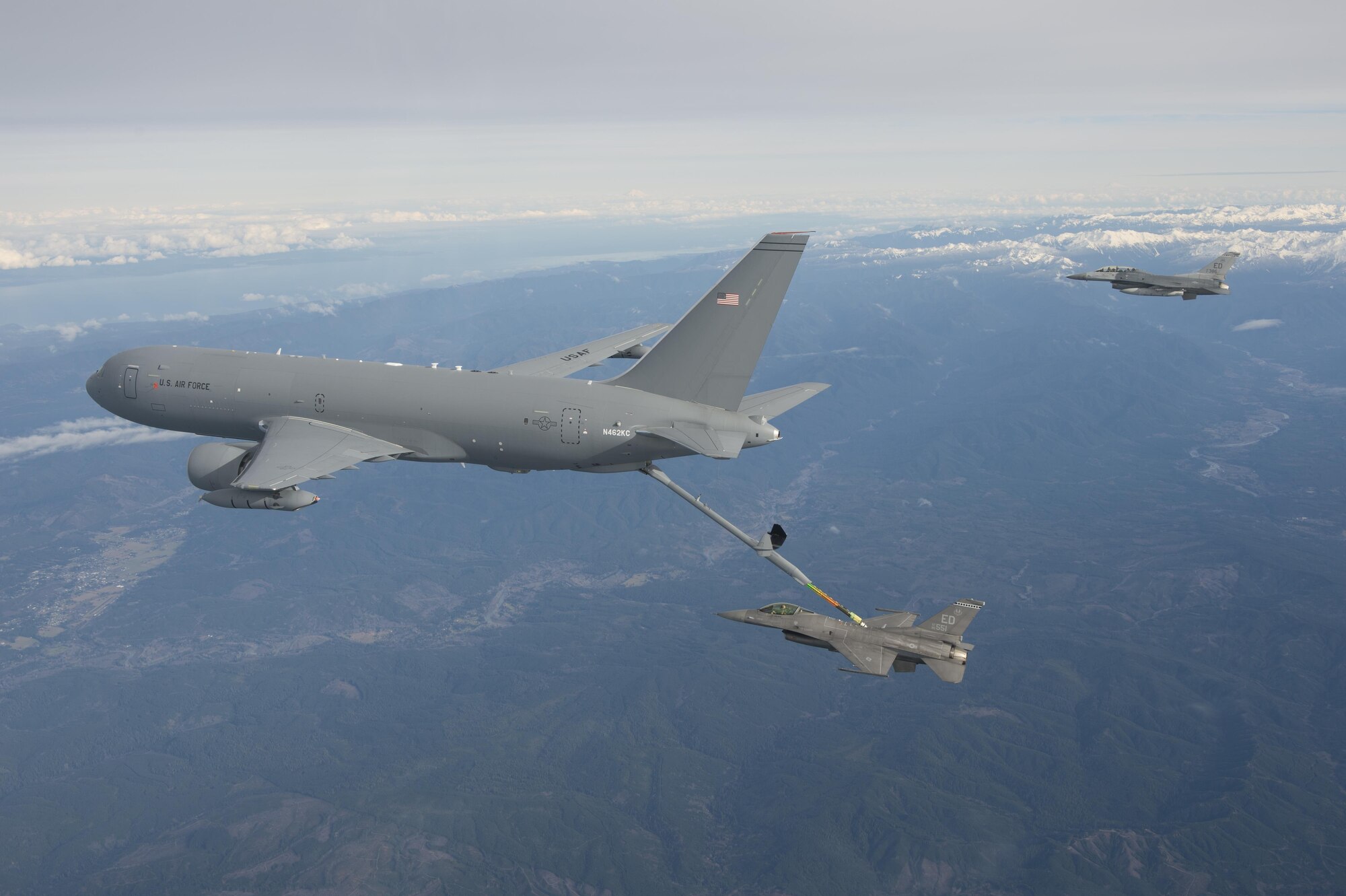 The KC-46A Pegasus performs its first-ever aerial refueling Jan. 24, 2016, passing 1,600 pounds of fuel to an F-16 Fighting Falcon. (Boeing photo/Paul Weatherman)