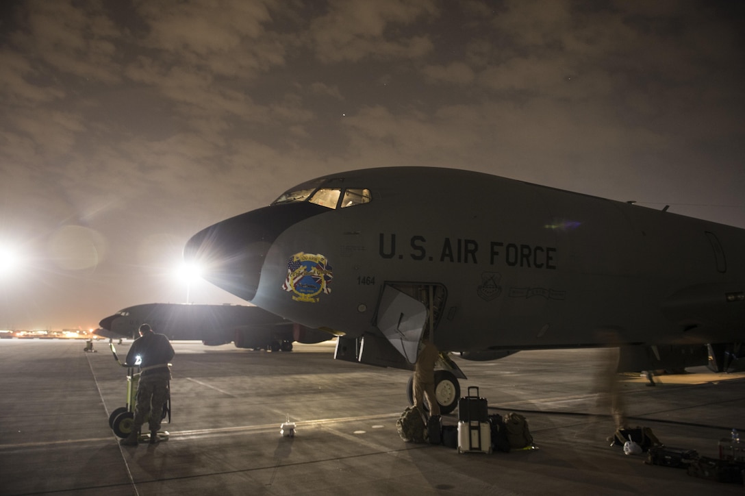 An Air Force KC-135 Stratotanker aircraft sits on the flightline at Al Udeid Air Base, Qatar, Jan. 27, 2016, after flying a mission over the Arabian Sea in support of Operation Inherent Resolve. The aircraft crew is assigned to the 340th Expeditionary Air Refueling Squadron. Air Force photo by Staff Sgt. Corey Hook