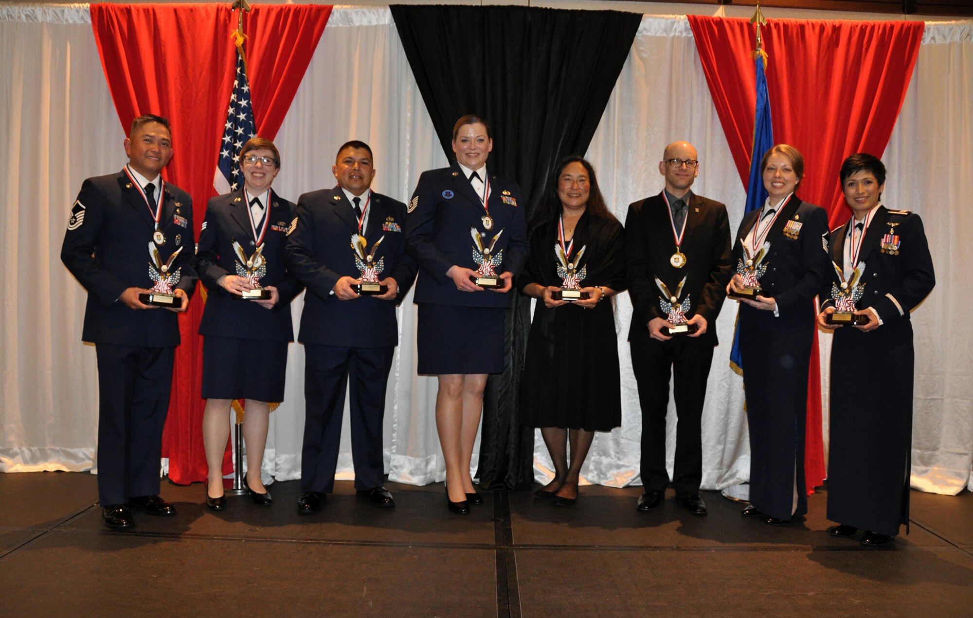 Members of the 349th Air Mobility Wing gathered to celebrate stand-out performers during a “Roaring Twenties” themed Annual Awards Banquet, January 23, 2016. The event, held at the Delta Breeze Club, honored a key spouse as well as civilian and military members from different units and ranks who went above and beyond during 2015. (U.S. Air Force photo/Staff Sgt. Cindy G. Alejandrez)