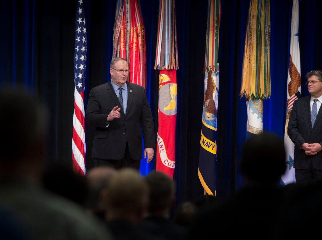 Deputy Defense Secretary Bob Work, left, offers remarks at the Combined Federal Campaign awards ceremony at the Pentagon, Jan. 28, 2016. DoD photo by Navy Petty Officer 1st Class Tim D. Godbee