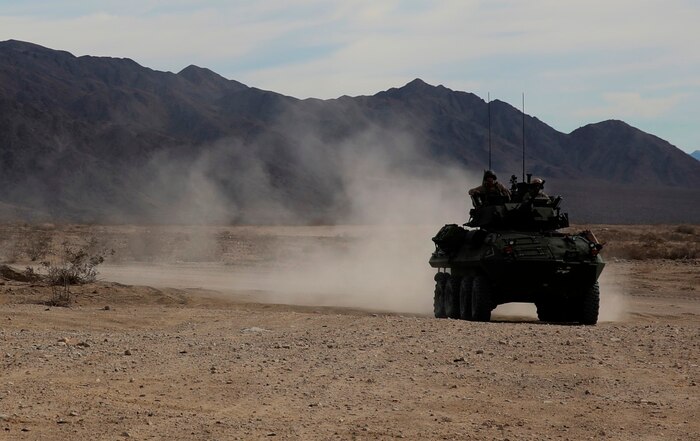 A light armored vehicle takes position for a live-fire gunnery qualification test at Marine Corps Air Ground Combat Center Twentynine Palms, Jan. 22, 2016. Live-fire tests like these allow the Marines of 1st Light Armored Reconnaissance Battalion, 1st Marine Division, I Marine Expeditionary Force to train for how they will execute their mission when they are deployed in a combat zone. (U.S. Marine Corps photo by Pvt. Robert Bliss)