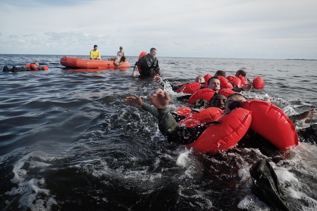 Airmen participate in water survival training near Homestead Air Reserve Base, Fla., Jan. 20, 2016. New York Air National Guard photo by Staff Sgt. Christopher S. Muncy