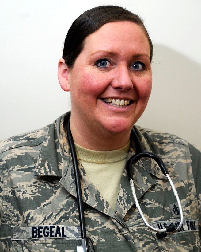 Staff Sgt. Christina Begeal, 22nd Medical Group aerospace medical technician, poses for a photo, Jan. 13, 2016, at McConnell Air Force Base, Kan. Begeal saved the life of an individual at a local restaurant who suffered a seizure during his work shift. (U.S. Air Force photo/Airman Jenna K. Caldwell) 
