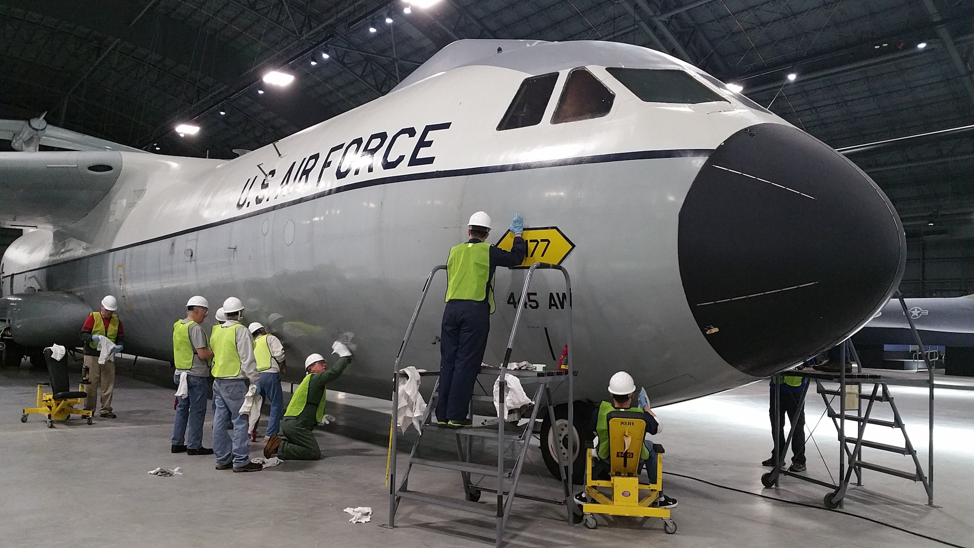 Volunteers cleaning and polishing the C-141 Starlifter "Hanoi Taxi" on January 28, 2016. The work is being done in preparation for the museum's new fourth building, which opens June 8th.