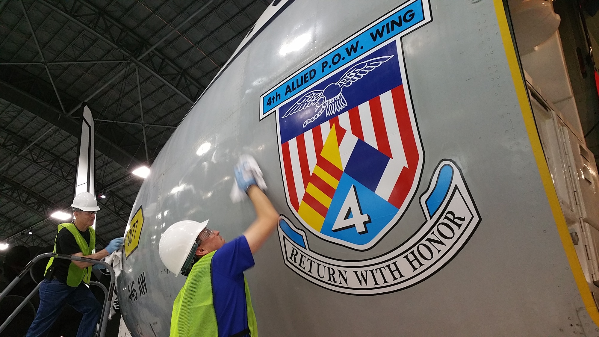 Volunteers cleaning and polishing the C-141 Starlifter "Hanoi Taxi" on January 28, 2016. The work is being done in preparation for the museum's new fourth building, which opens June 8th.
