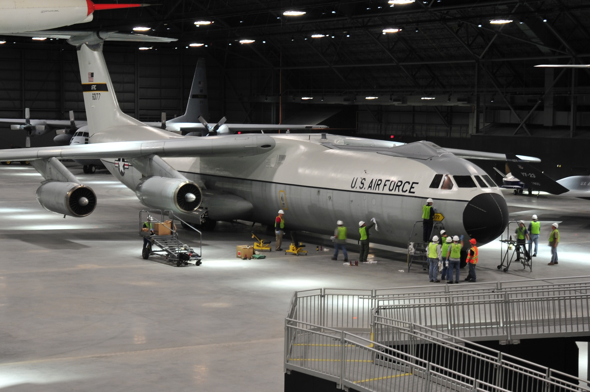 Volunteers cleaning and polishing the C-141 Starlifter "Hanoi Taxi" on January 28, 2016. The work is being done in preparation for the museum's new fourth building, which opens June 8th.