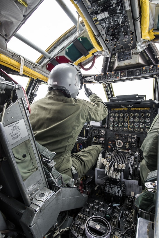 Maj. Luke Dellenbach, 69th Bomb Squadron assistant director of operations, gives a thumbs-up to ground crew from inside the cockpit of a B-52H Stratofortress before a training sortie at Minot Air Force Base, N.D., Jan. 14, 2016. Bomber Airmen work around the clock in all weather conditions in order to provide B-52H Stratofortress firepower on demand. (U.S. Air Force photo/Airman 1st Class J.T. Armstrong)