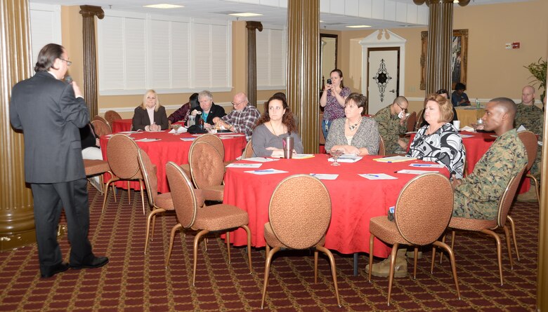 Anthony Eitel, director, Assessment and Accountability, Georgia Department of Education, educates active-duty service members, their spouses and the installation’s civilian personnel about the new Georgia Milestones Assessment System’s requirements for testing the area’s school-aged children. Base officials sponsored the ‘Lunch and Learn,’ Jan. 28, at Marine Corps Logistics Base Albany’s Town and Country Restaurant and Ballroom.

