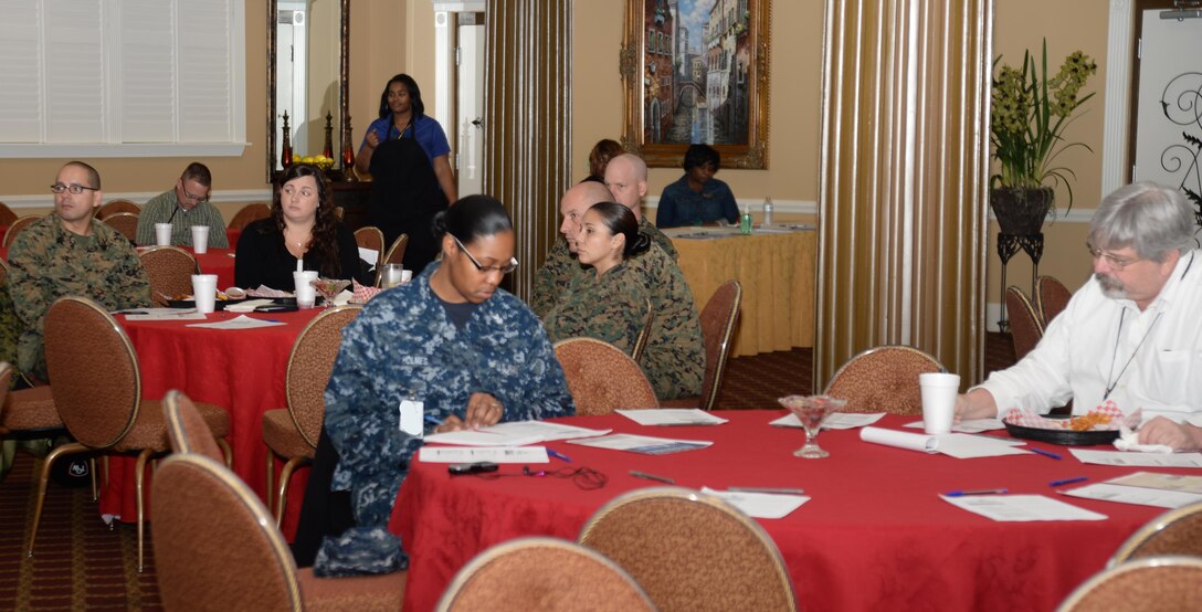Active-duty service members, their spouses as well as the installation’s civilian personnel attend a ‘Lunch and Learn’ forum, Jan. 28, at Marine Corps Logistics Base Albany’s Town and Country Restaurant and Ballroom. Base officials sponsored the event to address questions parents of school-aged children may have as the State rolls out the new 2016 Georgia Milestones Assessment System and testing requirements for the area’s students.