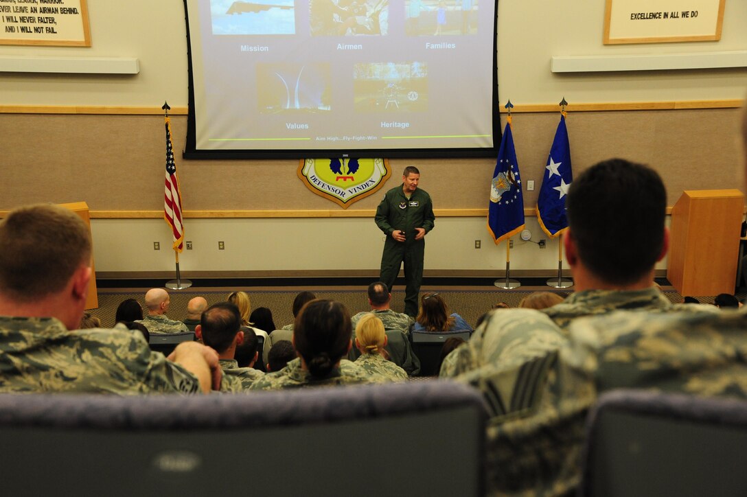 Air Force Global Strike Command commander Gen. Robin Rand gives a mission brief to Airmen and their spouses at Whiteman Air Force Base, Mo., Jan. 19, 2016. The brief focused on resiliency, leadership and families, and the importance of maintaining balance in life. (U.S. Air Force photo by Senior Airman Keenan Berry)