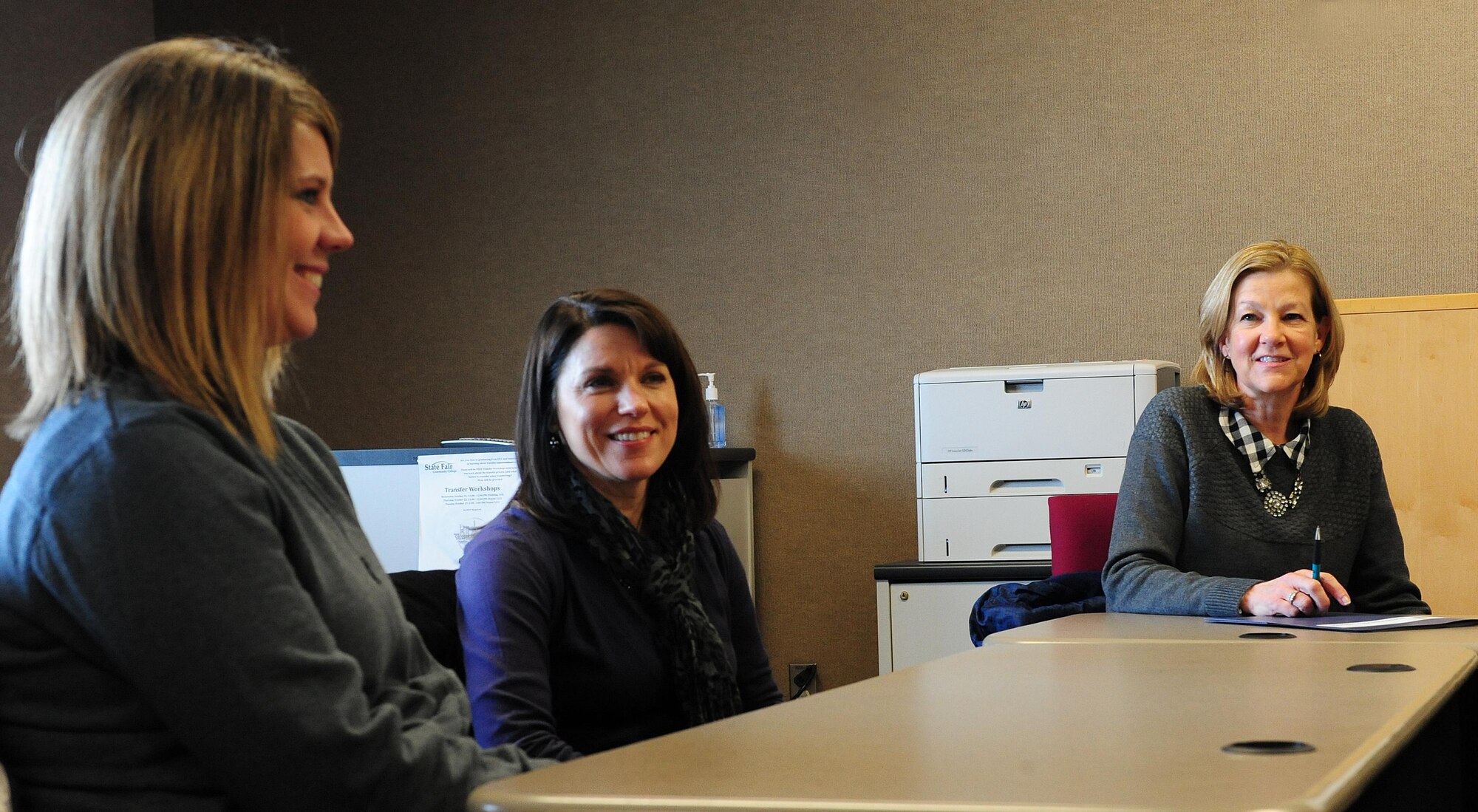 Kim Rand, right, wife of AFGSC commander Gen. Robin Rand, and Angelle Tibbets, center, wife of the 509th Bomb Wing commander Brig. Gen. Paul Tibbets IV, discuss key issues with Sarah Sheteron, wife of Staff Sgt. Lloyd Sheteron Jr., a 509th Civil Engineer Squadron water and waste-water treatment plant operator, during a meeting at Whiteman Air Force Base, Mo., Jan. 20, 2016. Representatives from the Airman and Family Readiness Center briefed Mrs. Rand, Mrs. Tibbets and spouses of deployed service members on available resources and programs. (U.S. Air Force photo by Airman 1st Class Jazmin Smith) 