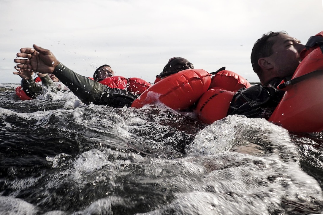 Airmen participate in water survival training near Homestead Air Reserve Base, Fla., Jan. 20, 2016. New York Air National Guard photo by Staff Sgt. Christopher S. Muncy