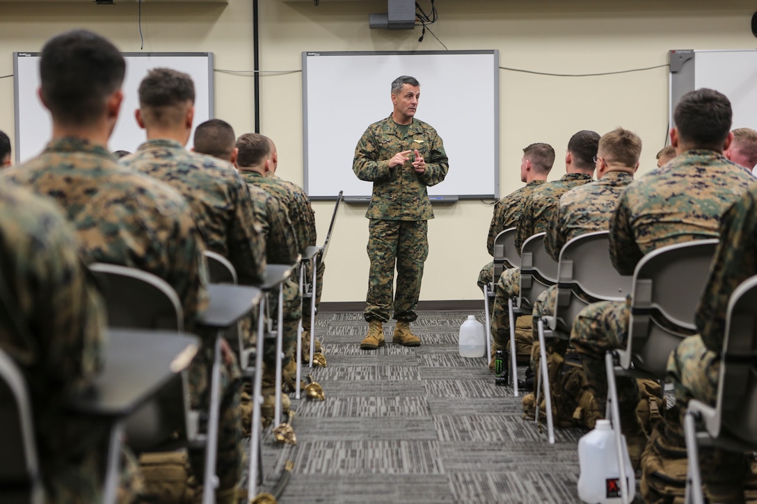 Maj. Gen. Michael Rocco, commanding general of 3rd Marine Aircraft Wing, talks to Marines with Marine Aircraft Group (MAG) 39 Corporals Course 341-16 aboard Marine Corps Base Camp Pendleton, Calif., Jan. 14. Eighty-one Marines graduated the three-week long training course, Jan. 27. (U.S. Marine Corps photo by Lance Cpl. Harley Robinson/Released)