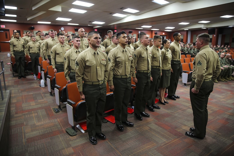 Marines with Marine Aircraft Group (MAG) 39 Corporals Course 341-16 recite the Noncommissioned Officer Creed during their graduation aboard Marine Corps Base Camp Pendleton, Calif., Jan. 27. Eighty-one Marines graduated the three-week long training course required for corporals to earn the next rank. (U.S. Marine Corps photo by Cpl. Alissa Schuning/Released)