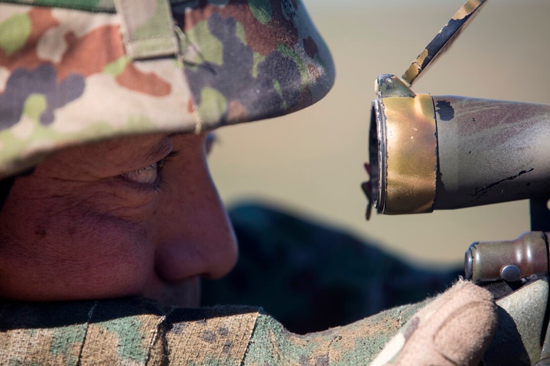 A Japan Ground Self-Defense Force soldier sites in on a target at an unknown distance range aboard Marine Corps Base Camp Pendleton Calif., Jan 28, 2016. The JGSDF soldiers were training with instructors from 1st Marine Divisions Pre-Scout Sniper Course as a part of Exercise Iron Fist, an annual bilateral training exercise designed to improve the U.S. and Japan’s bilateral amphibious operation capabilities.