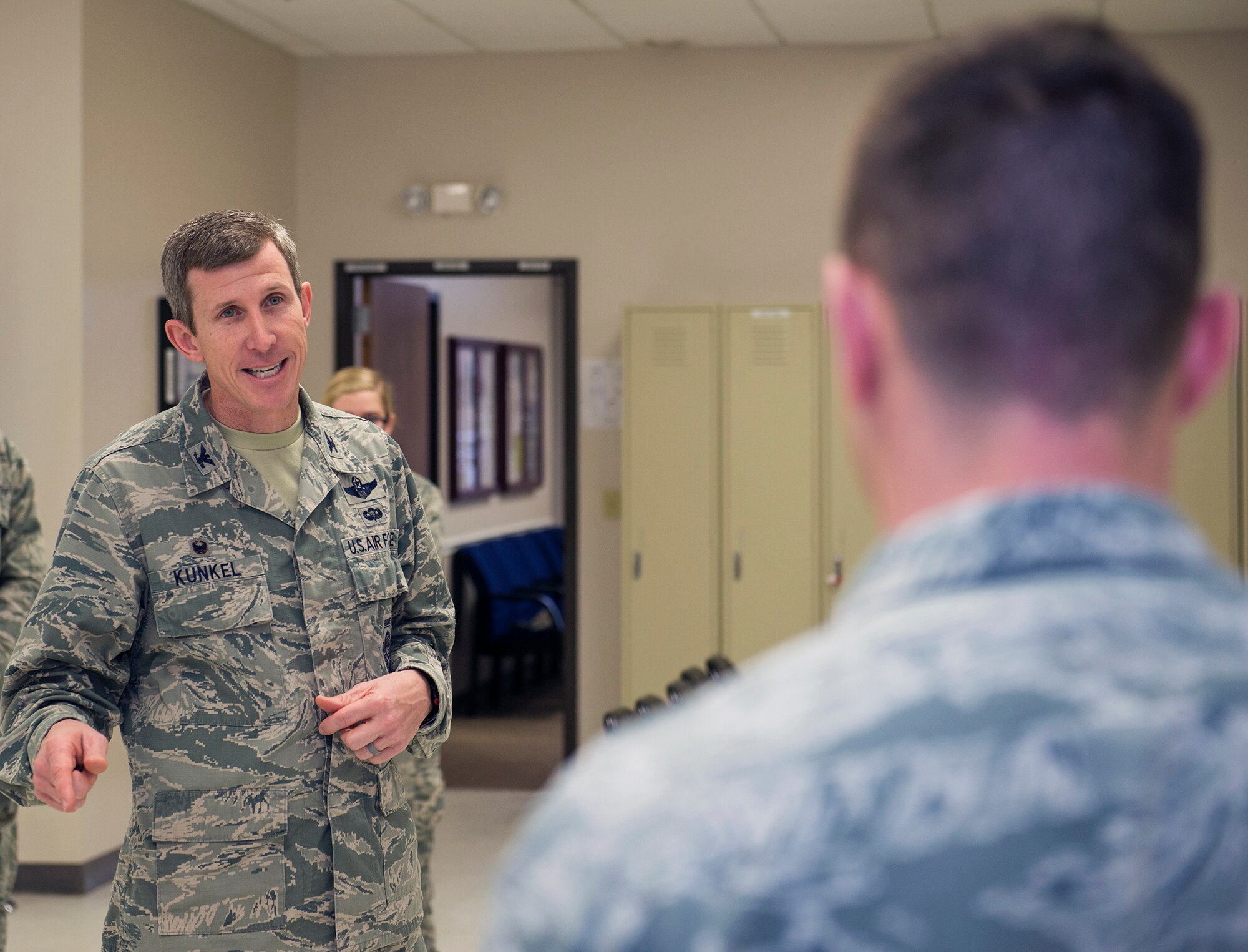 U.S. Air Force Col. Thomas Kunkel, 23d Wing commander, speaks with members of the Moody Base Honor Guard after training, Jan. 28, 2016, at Moody Air Force Base, Ga. Kunkel commended the Airmen for guardsmen and exemplifying selfless service. (U.S. Air Force photo by Airman 1st Class Greg Nash/Released) 