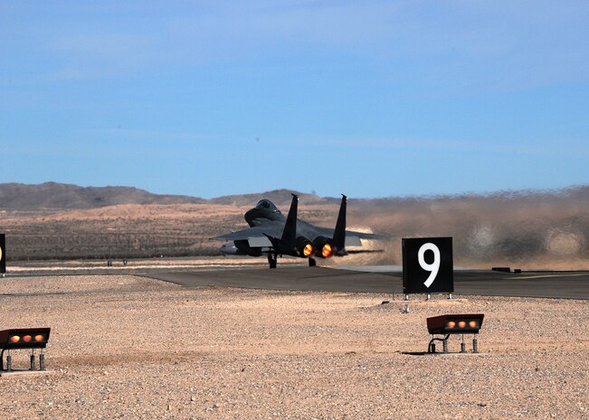 An F-15 Eagle from the 104th Fighter Wing, Massachusetts Air National Guard, takes off from Nellis Air Force Base, Nev., during Red Flag 16-1 Jan. 26, 2016. Red Flag will enhance the 104th FW’s aircrews’ combat readiness and survivability by challenging them with realistic combat scenarios. (U.S. Air National Guard photo by Senior Airman Loni Kingston)
