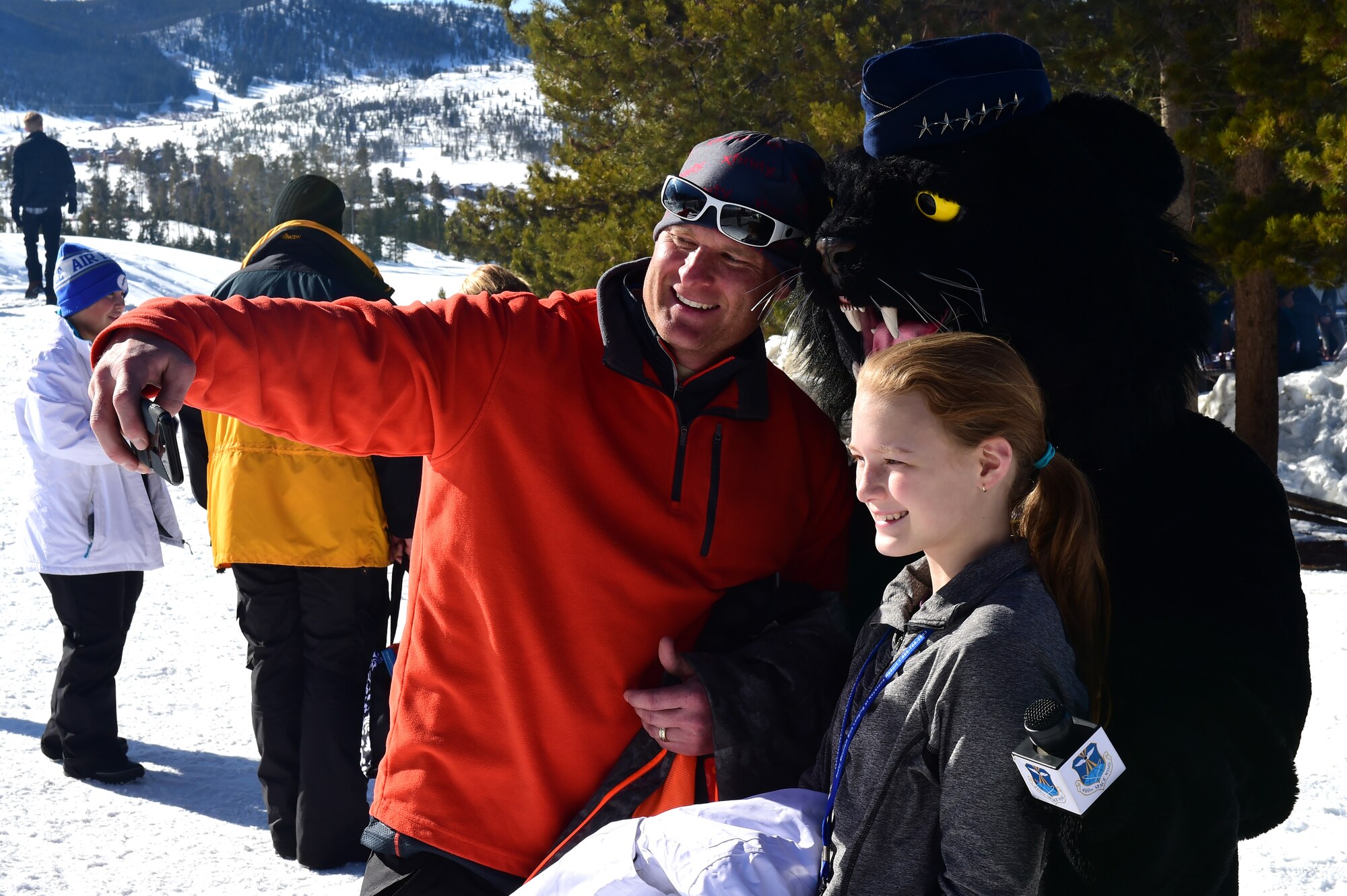 Members of Team Buckley pose for a selfie with Buck Lee, 460th Space Wing mascot, during Snofest Jan. 23, 2016, at Keystone Resort, Colo. Snofest is a military appreciation event at Keystone Resort for the Front Range Military Bases, which includes skiing, snowboarding and many discounts for military members. (U.S. Air Force photo by Airman 1st Class Gabrielle Spradling/Released)