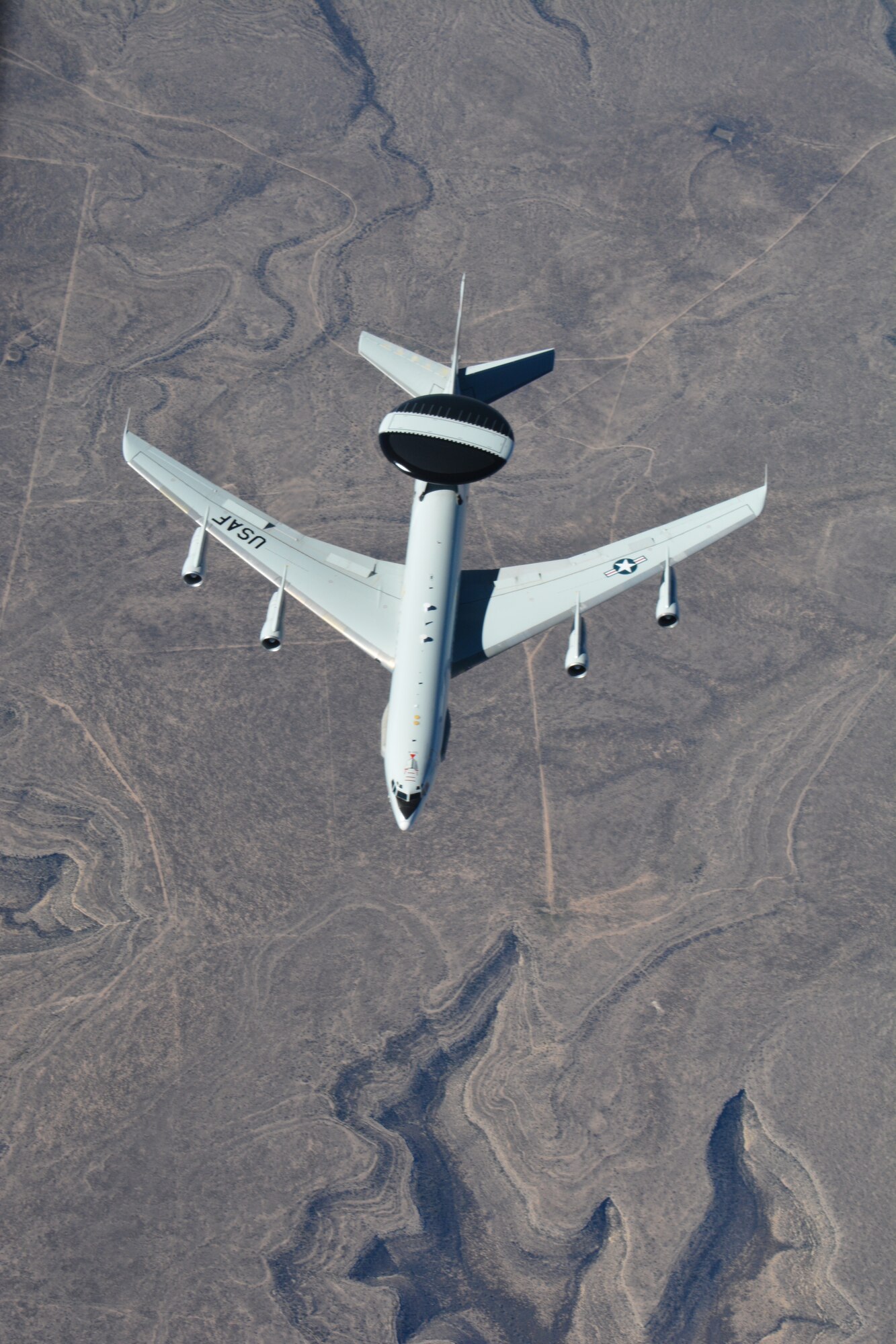 An E-3 Sentry Airborne Warning and Control System aircraft flown by the 552nd Air Control Wing at Tinker Air Force Base, Okla., descends following an aerial refueling with a 507th Air Refueling Wing KC-135R over Texas Jan. 19, 2016. (U.S. Air Force/Maj. Jon Quinlan)
