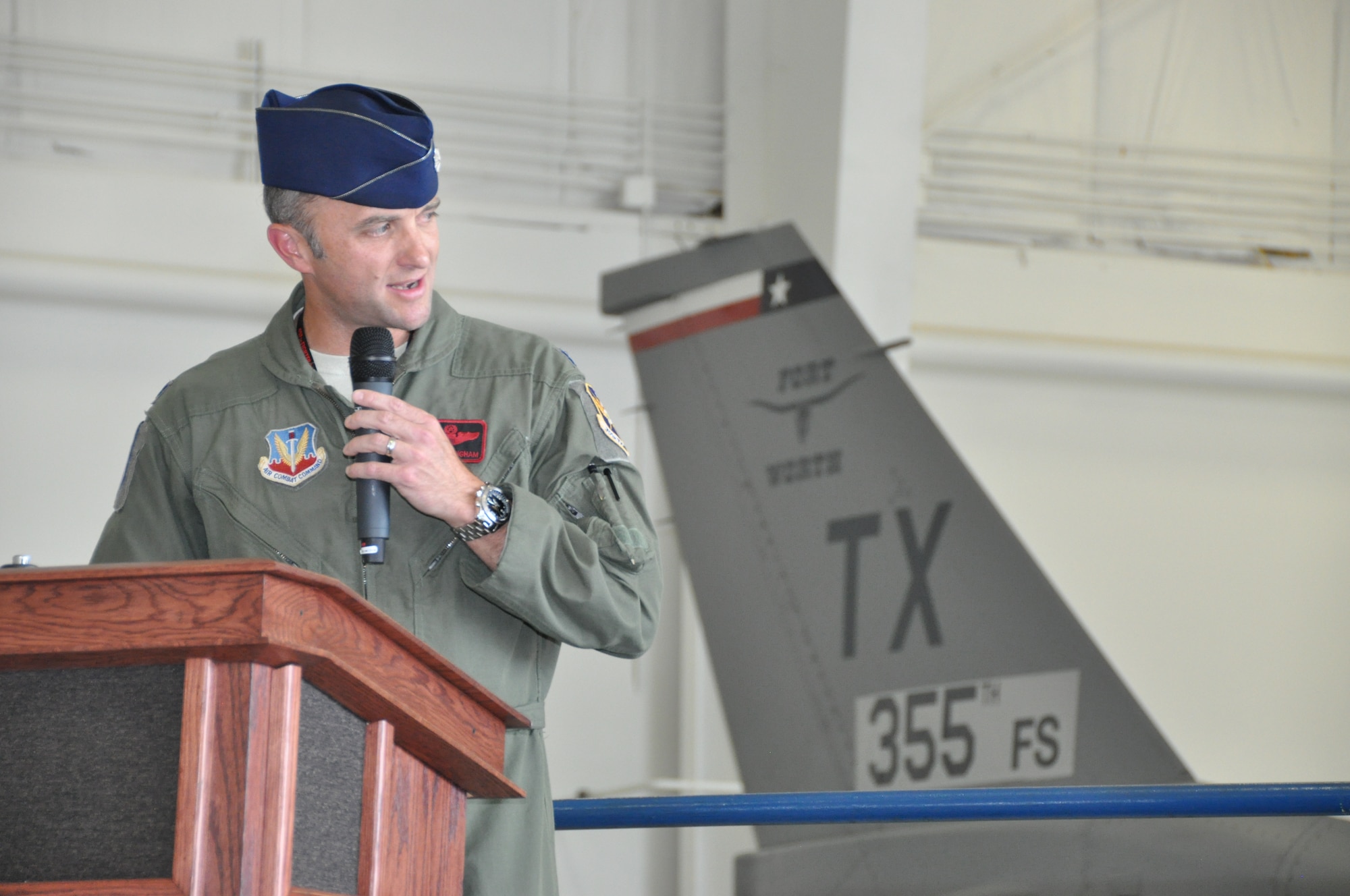 NAVAL AIR STATION FORT WORTH JOINT RESERVE BASE, Texas – Lt. Col. Jeffrey Cunningham, 355th Fighter Squadron commander, addresses the audience Oct. 5 gathered to witness the World War II fighter squadron re-designation ceremony here. The 355 FS, who flies the F-16 Fighting Falcon alongside the 301st Fighter Wing, is the first active associate fighter squadron within the Air Force Reserve. (U.S. Air Force photo by Ms. Julie Briden-Garcia)