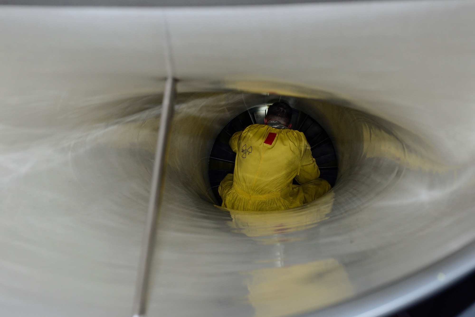 U.S. Air Force Staff Sgt. Rick Jones, a crew chief assigned to the 480th Expeditionary Fighter Squadron, inspects the intake of a 480th EFS F-16 Fighter Falcon fighter aircraft, during a flying training deployment on the flightline at Souda Bay, Greece, Jan. 27, 2016. The training allows the NATO partners to fly together to strengthen their joint military capability. (U.S. Air Force photo by Staff Sgt. Christopher Ruano/Released)