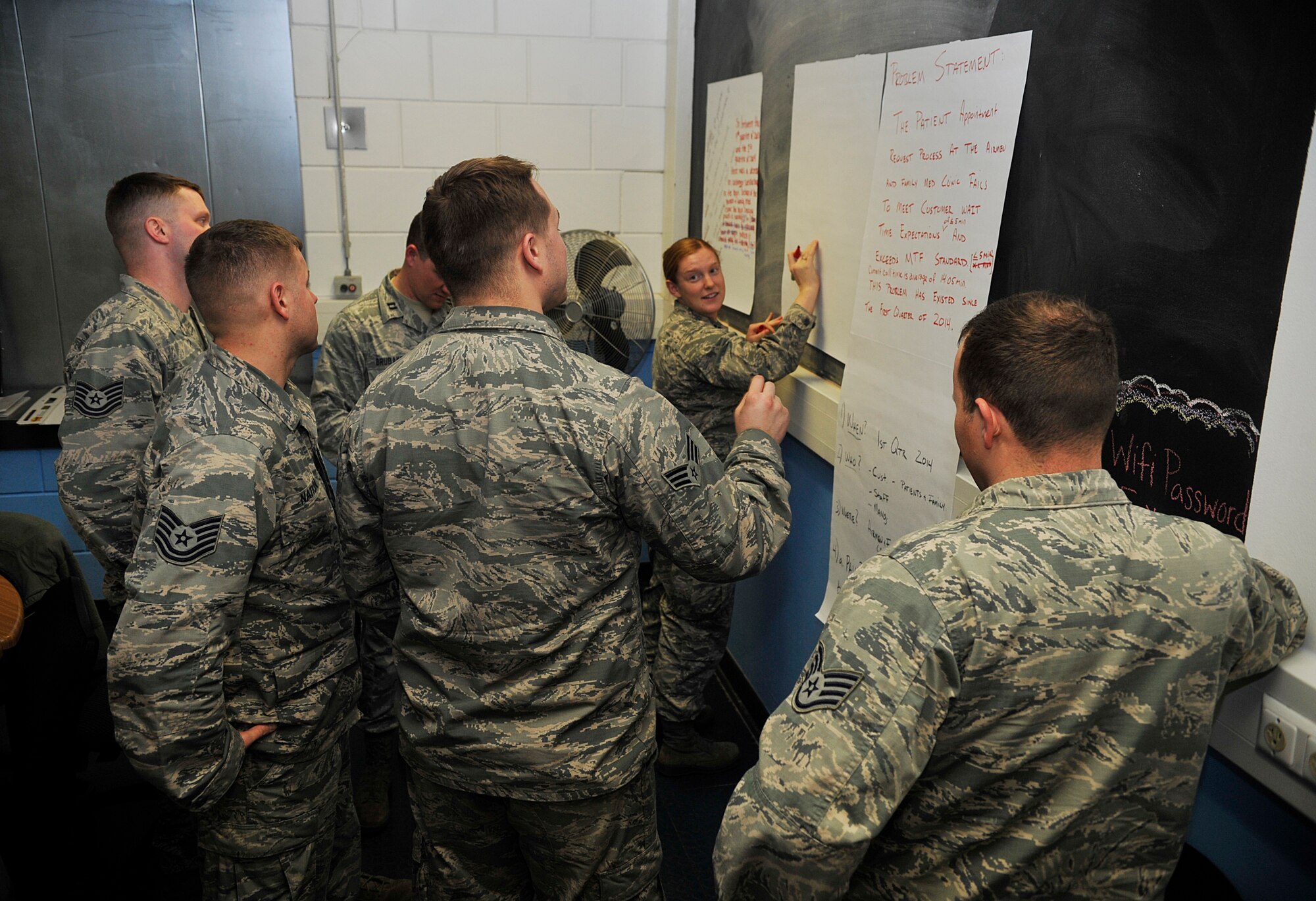 Airmen from the 86th Airlift Wing solve a simulated problem during Problem Identification Training Jan. 12, 2016, at Ramstein Air Base, Germany. PIT is available to all Airmen and gives them the opportunity to learn problem-solving skills and in turn, help them come up with innovative ways to better processes in their individual units. Wings across the U.S. Air Forces in Europe Air Forces Africa are preparing for Innovation Madness 2016, which helps build an innovation culture year-round. (U.S. Air Force photo/Airman 1st Class Larissa Greatwood)