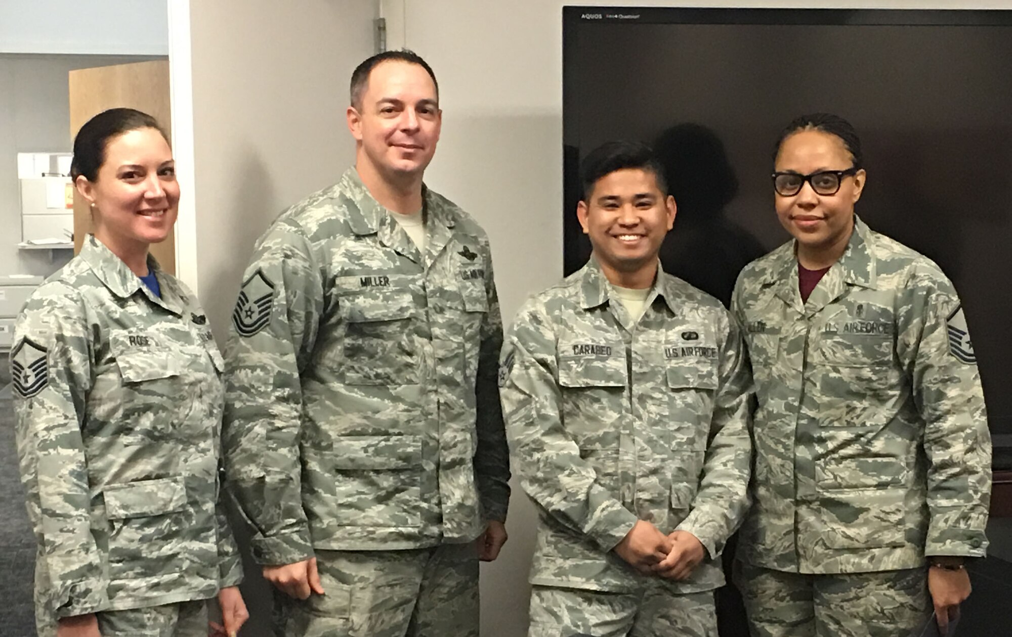 The Tinker Top 3 Council recently held its first meeting of the new year where the past year’s accomplishments were highlighted and goals for the upcoming year were set. During the meeting, the Airmanship Award for November was presented to Senior Airman Chitobong Carabeo, a contracting officer in the Air Force Sustainment Center Contracting Directorate, third from left. With Airman Carabo are, from left, Master Sgt. Stephanie Rose, 966th Airborne Air Control Squadron; Master Sgt. Brack Miller, 552nd Operations Support Squadron; and Master Sgt. Nonika Allen, 72nd Dental Squadron. Also during the meeting, newly elected council members were announced. They are Sergeant Allen, president; Sergeant Miller, vice president; Master Sgt. Steven Carlson, 552nd Operations Group, secretary; Master Sgt. Teodros Rembert, 960th AACS, treasurer; Tech. Sgt. Mitchell Zebert, 373rd Training Squadron; and Sergeant Rose, publicity. Top 3 monthly meetings are held at 3 p.m. the third Friday of the month in the Tinker Club Daedalian Room. For more information, visit the council’s Facebook page at www.facebook.com/TinkerTop3. (Courtesy photo/Released)