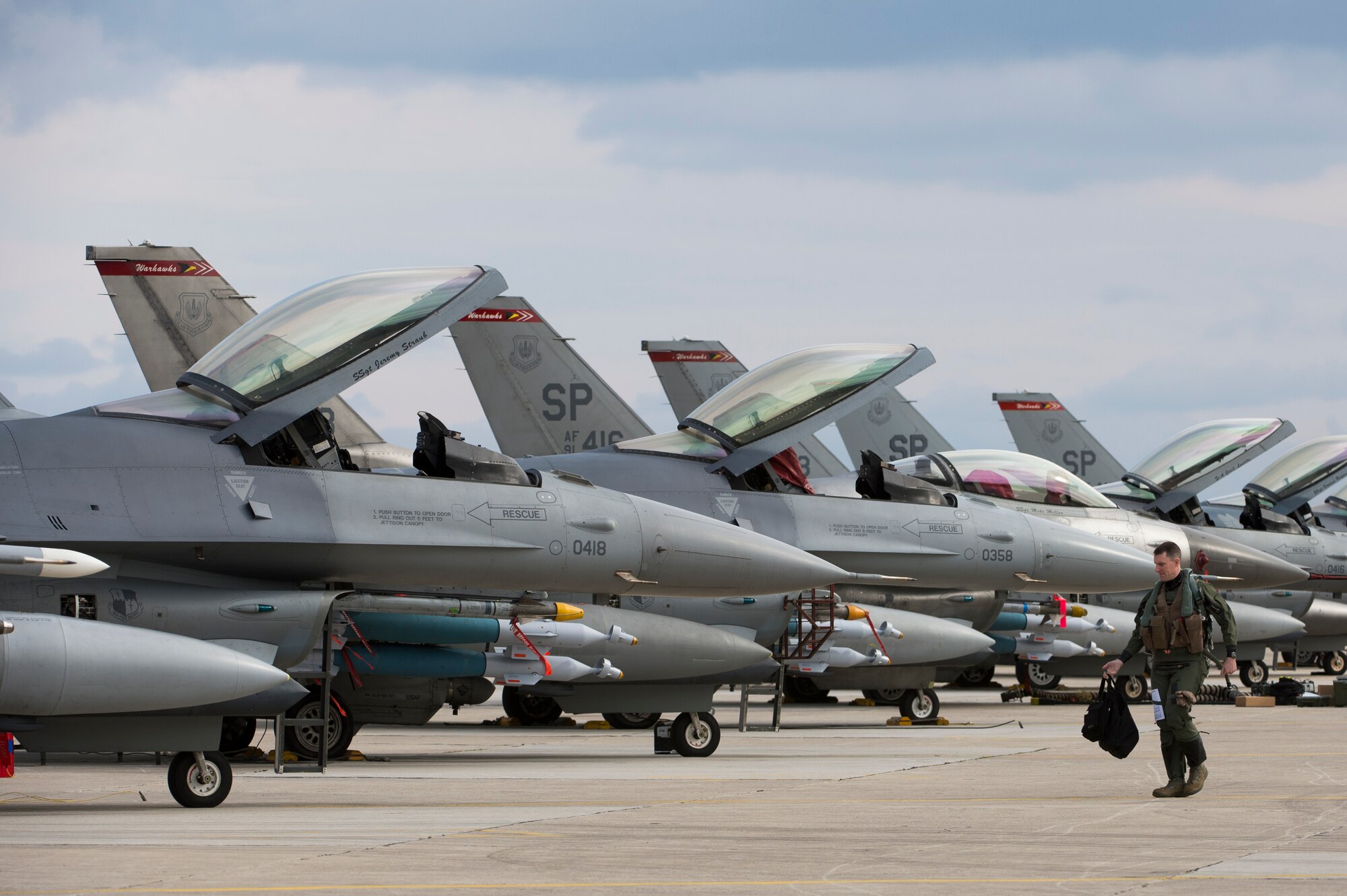 A U.S. Air Force F-16 Fighting Falcon fighter aircraft pilot assigned to the 480th Expeditionary Fighter Squadron heads to his aircraft on the flightline during a flying training deployment at Souda Bay, Greece, Jan. 27, 2016. The aircraft conducted the training as part of the bilateral deployment between the Greek and U.S. Air Forces to develop interoperability and cohesion between the two NATO partners. (U.S. Air Force photo by Staff Sgt. Christopher Ruano/Released)