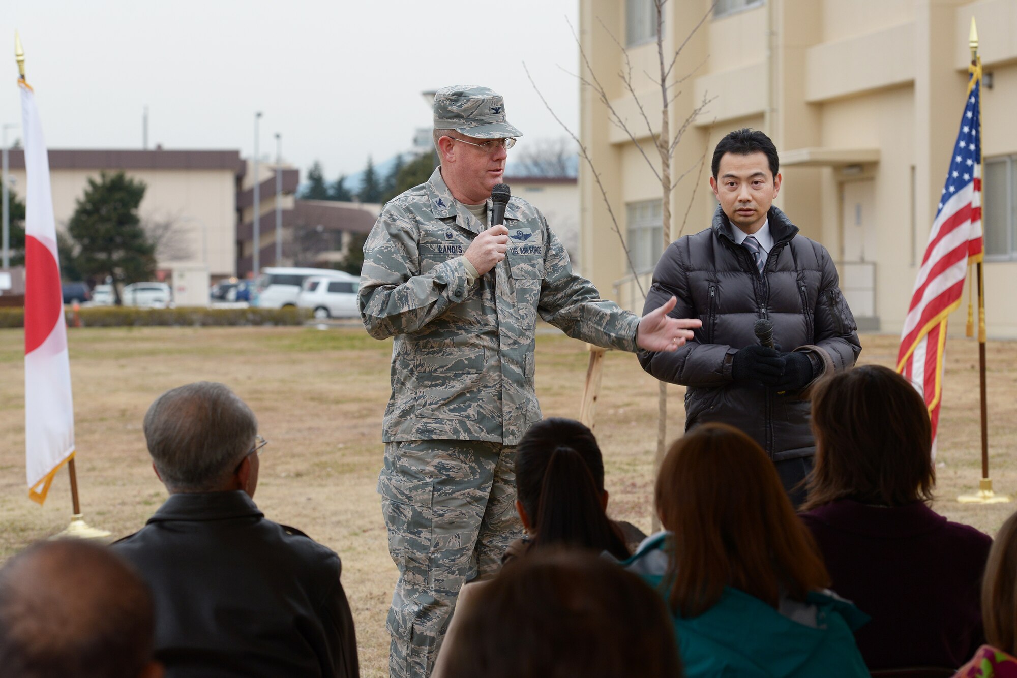 Col. Dale Landis, 515th Air Mobility Operations Group commander, addresses a crowd during a tree planting ceremony at Yokota Air Base, Japan, Jan. 23, 2016. The tree planting ceremony represented the friendship between the 730th Air Mobility Squadron and 515th Air Mobility Operations Group and the city of Hamura; it also recognized the 10-year anniversary of the friendship club. (U.S. Air Force photo by Staff Sgt. Cody H. Ramirez/ Released)