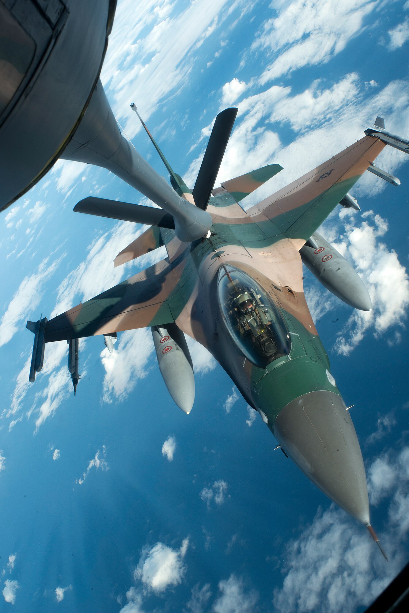 A U.S. Air Force F-16 Fighting Falcon from the 18th Aggressor Squadron refuels from a KC-135 Stratotanker during Forceful Tiger Jan. 28, 2016, near Okinawa, Japan. The F-16 is a compact, multi-role fighter aircraft designed to provide air-to-air combat and air-to-surface attack capabilities as a relatively low-cost, high-performance weapon system for the U.S. and allied nations. (U.S. Air Force photo by Staff Sgt. Maeson L. Elleman)