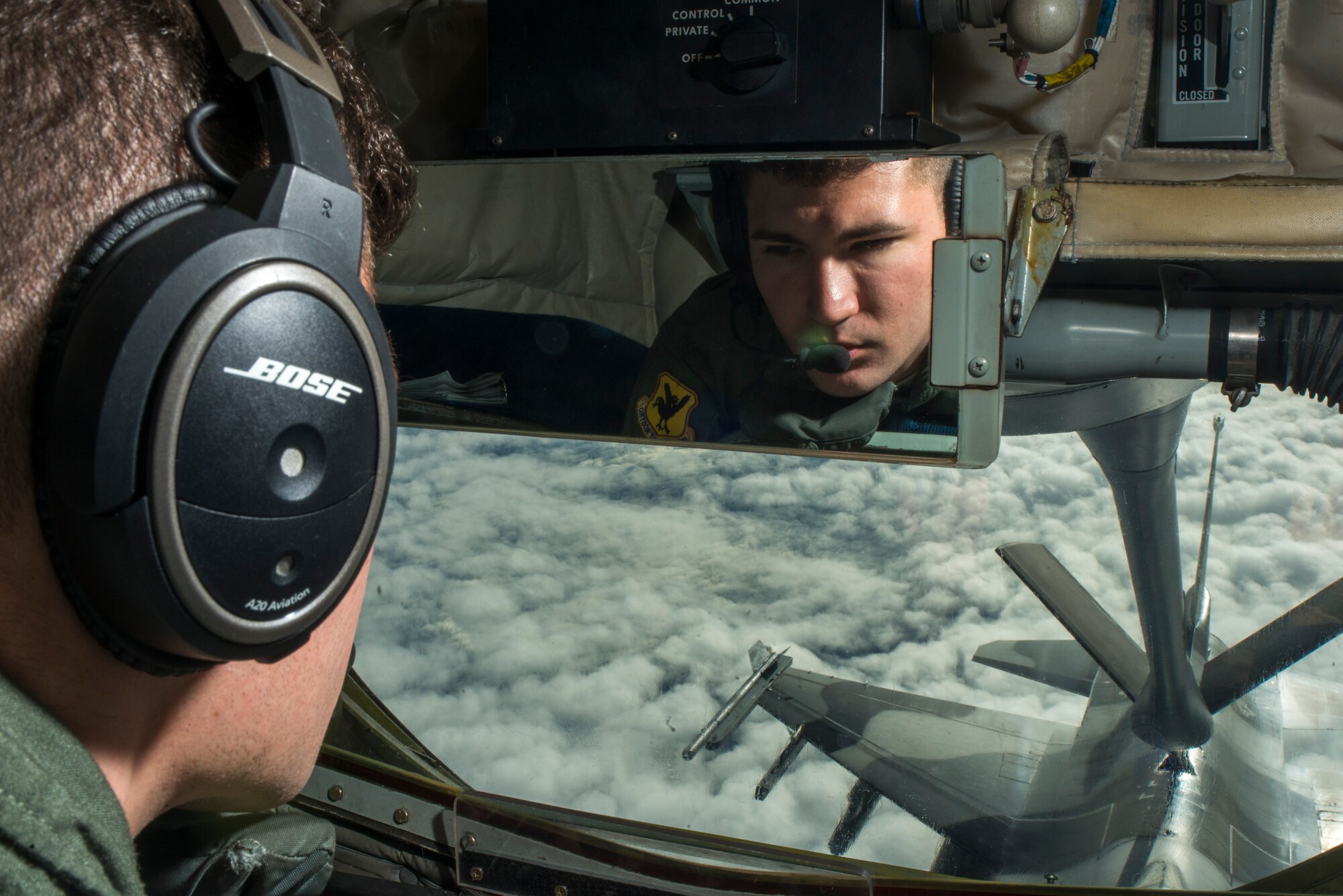 U.S. Air Force Airman 1st Class Ryan Hortman, 909th Air Refueling Squadron boom operator, refuels an 18th Aggressor Squadron F-16 Fighting Falcon during Forceful Tiger Jan. 28, 2016, near Okinawa, Japan. The KC-135 has provided the ability to project forces anywhere in the world since it first entered the service in 1957. (U.S. Air Force photo by Staff Sgt. Maeson L. Elleman)