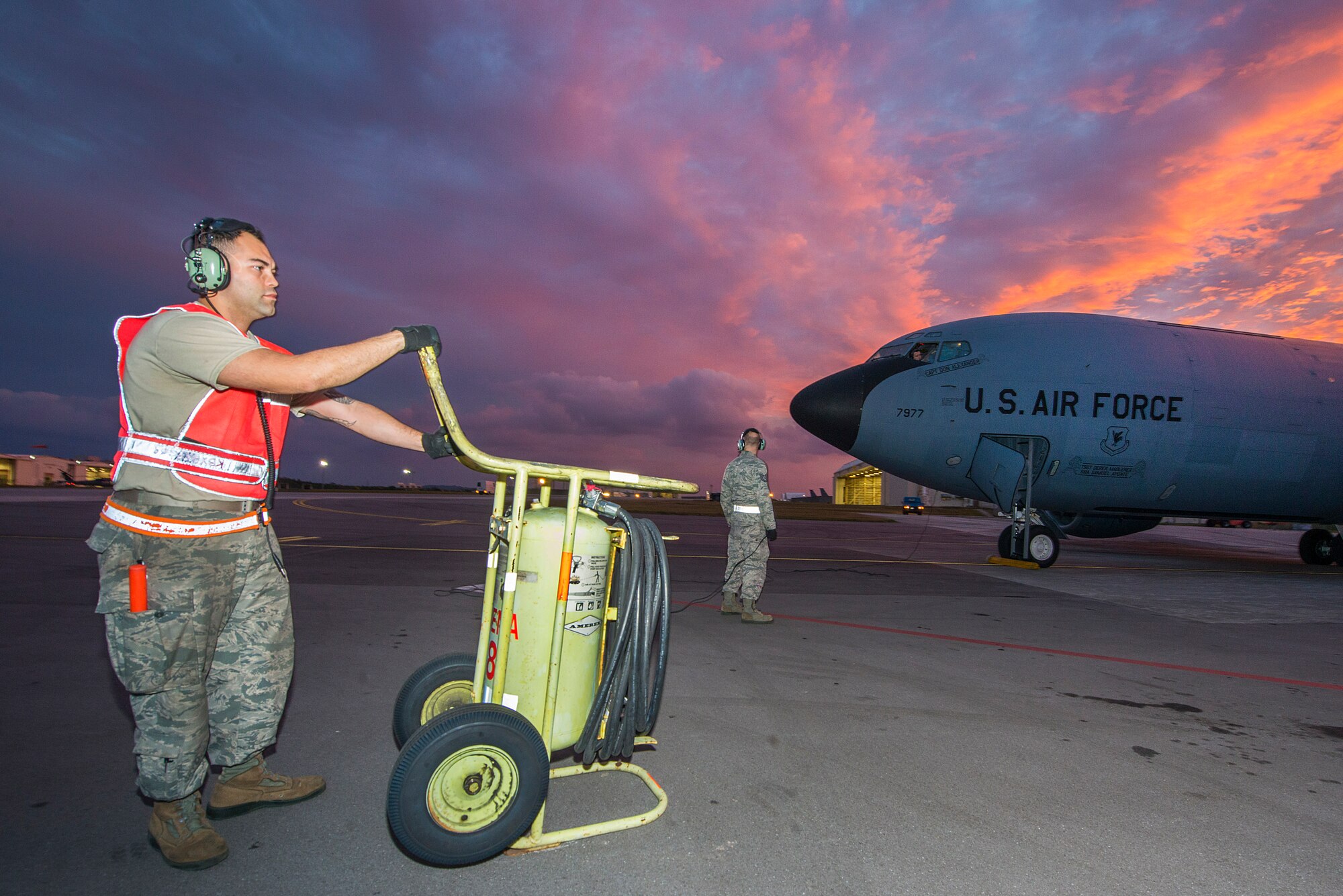 U.S. Air Force aircraft maintainers from the 909th Aircraft Maintenance Unit prepare a KC-135 Stratotanker for takeoff during Forceful Tiger Jan. 28, 2016, at Kadena Air Base, Japan. Thanks to the maintainers at the 909th AMU, the 909th Air Refueling Squadron was able to generate 15 KC-135 sorties with a 100-percent mission success rate for the large force exercise. (U.S. Air Force photo by Staff Sgt. Maeson L. Elleman)
