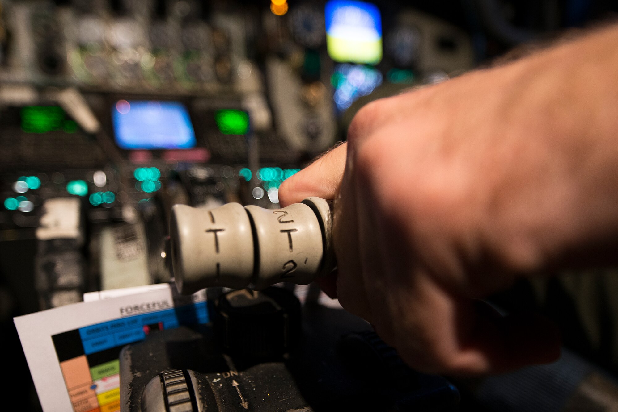 A U.S. Air Force KC-135 Stratotanker pilot from the 909th Air Refueling Squadron adjusts the aircraft’s engine throttles before takeoff from Kadena Air Base, Japan, during Forceful Tiger Jan. 28, 2016.  Forceful Tiger is an annual large force exercise designed to demonstrate the U.S. military’s combat capabilities in the region. (U.S. Air Force photo by Staff Sgt. Maeson L. Elleman)