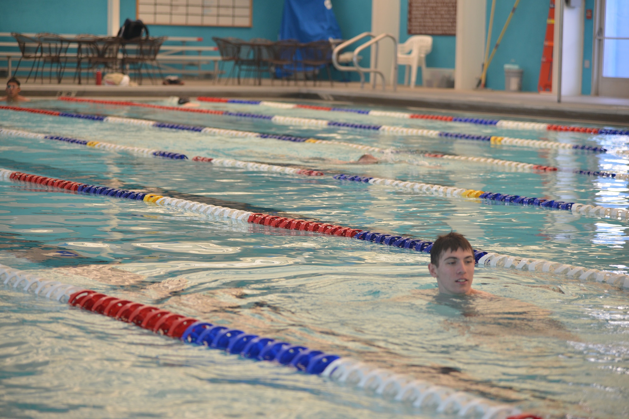 Airman 1st Class Alan Pae, 342th Training Squadron, does laps at the indoor pool. The pool recently reopened after a renovation that replaced an aging liner and several other upgrades.  (Photo by Todd Berenger)
