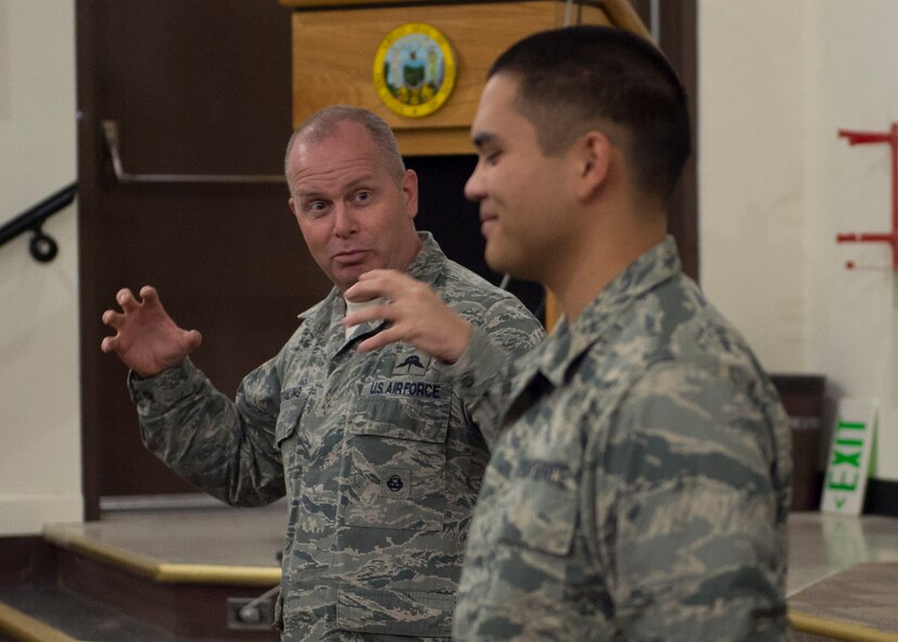 Command Chief Master Sergeant of the Air National Guard James W. Hotaling identified the newest member, Airman Basic Cox assigned to the 124th Fighter Wing Student Flight, and called him to the stage at an enlisted all during his visited the 124th Fighter Wing at Gowen Field, Boise, Idaho, Jan. 9, 2016. (U.S. Air National Guard Photos by Tech. Sgt. Sarah Pokorney)