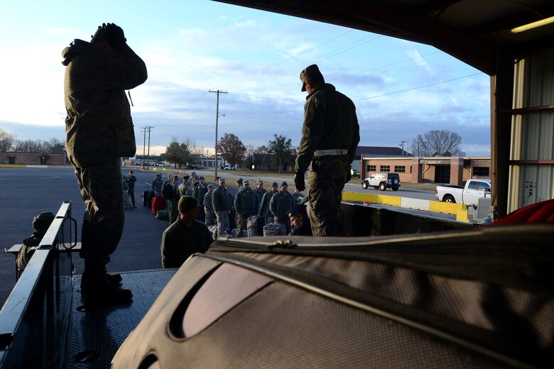 Airmen with the South Carolina Air National Guard at McEntire Joint National Guard Base, S.C., wait in line for their bags to be searched and weighed in preparation for a training deployment to Nellis Air Force Base, Nev., Jan. 21, 2016.(U.S. Air National Guard photo by Senior Airman Ashleigh Pavelek)