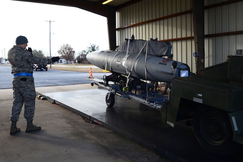 U.S. Air Force Staff Sgt. Joshua Williams, an air cargo transportation specialist assigned to the 169th Logistics Readiness Squadron, measures the weight and center balance of machine equipment during a mid-point inspection with the 169th Wing Inspection Team at McEntire Joint National Guard Base, S.C., Jan. 20, 2016. The W.I.T program ensures that all of the 169th Fighter Wing squadrons are performing procedures in accordance with the regulations mandated by the Air Combat Command. (U.S. Air National Guard photo by Senior Airman Ashleigh S. Pavelek)