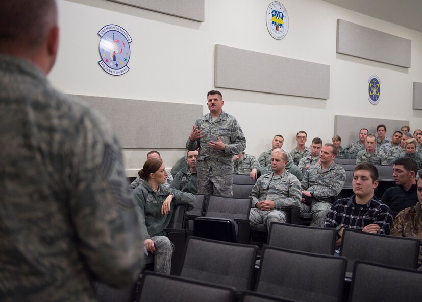 Command Chief Master Sergeant of the Air National Guard James W. Hotaling fields a question from Staff Sgt. Dean Barney, a 124th Aircraft Maintenance Squadron aircraft electrical and environmental systems specialist, during visits the 124th Fighter Wing at Gowen Field, Boise, Idaho, Jan. 9, 2016. Chief Master Sgt. James W. Hotaling took time during the visit to speak with 124th Fighter Wing’s junior enlisted Airmen during an enlisted all call. (U.S. Air National Guard Photos by Tech. Sgt. Sarah Pokorney)